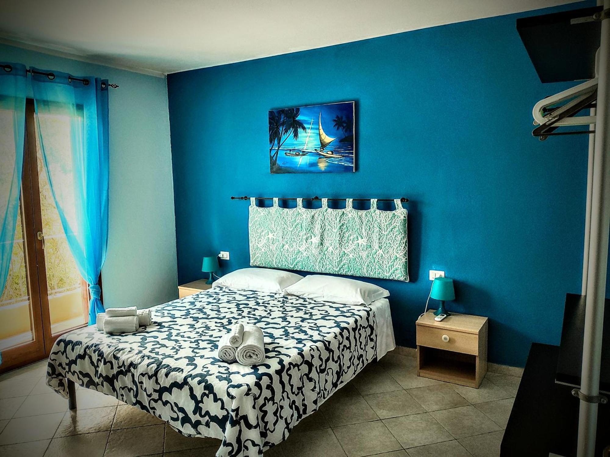Residenze L'Isola Surf House Lejlighedshotel Porto Pollo Eksteriør billede