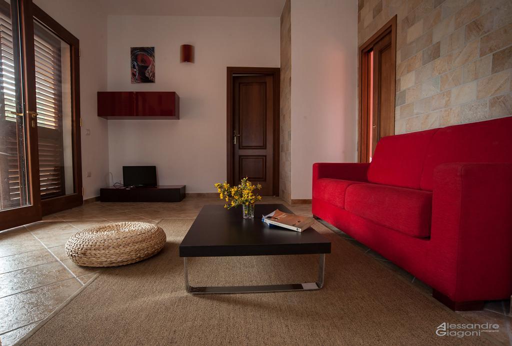 Residenze L'Isola Surf House Lejlighedshotel Porto Pollo Værelse billede