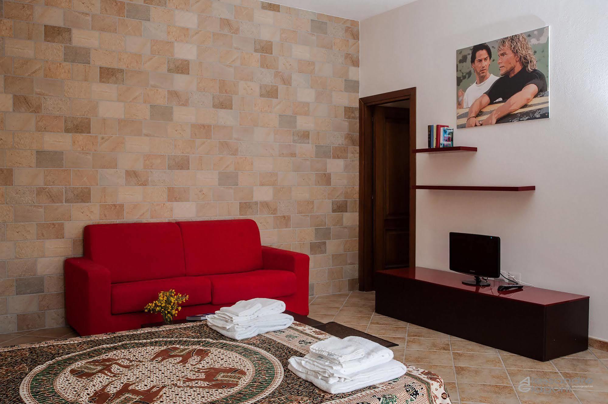 Residenze L'Isola Surf House Lejlighedshotel Porto Pollo Eksteriør billede
